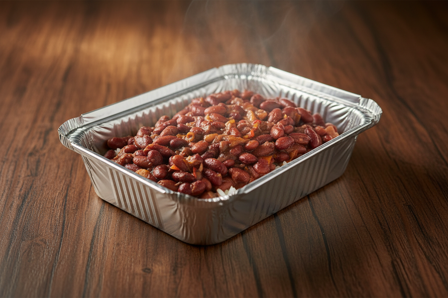 A take-out container filled with red beans over rice.